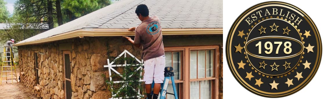 ACME Gutter Co. crew installing rain gutters in Flagstaff, AZ